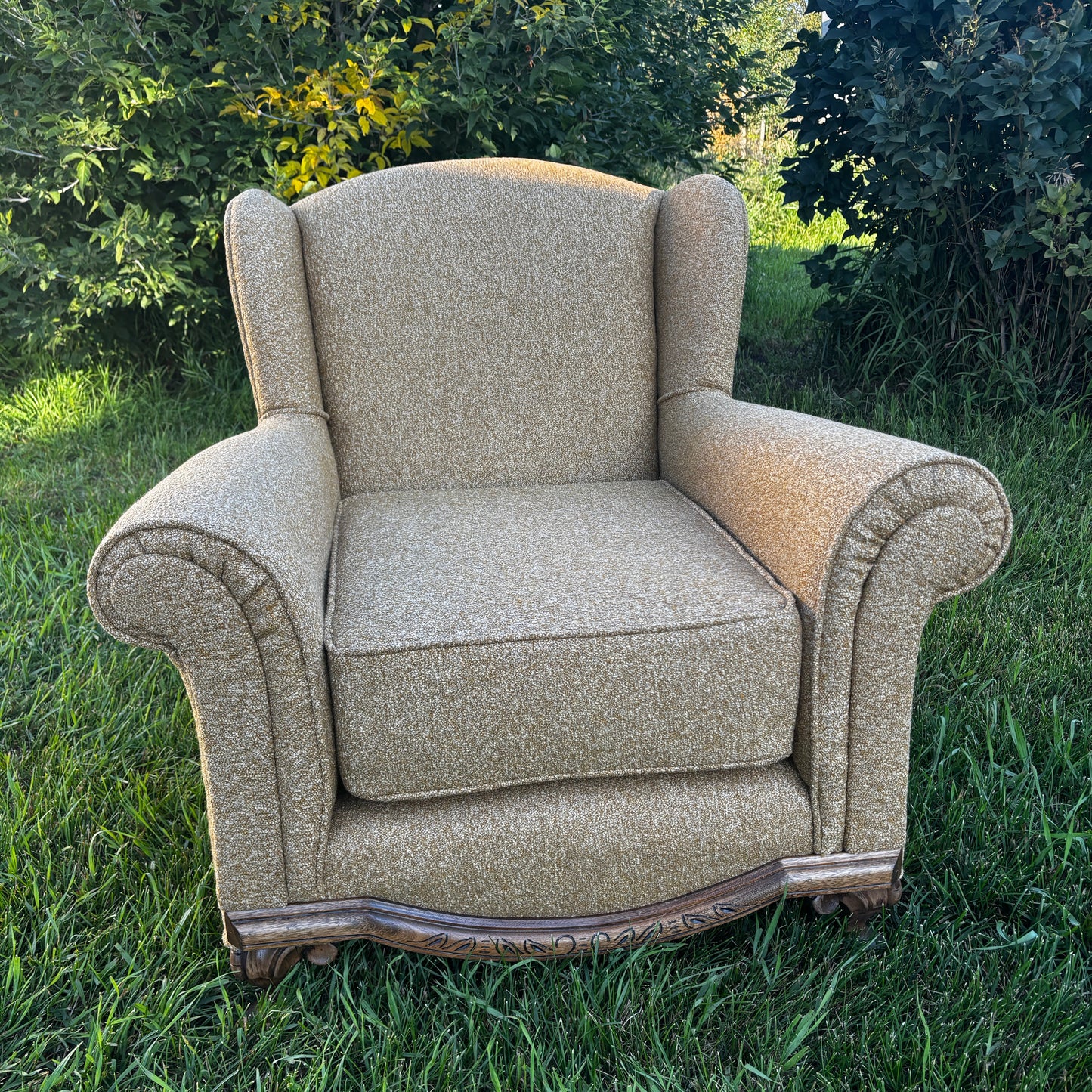 Antique Wingback Chair with Organic Bouclé Upholstery