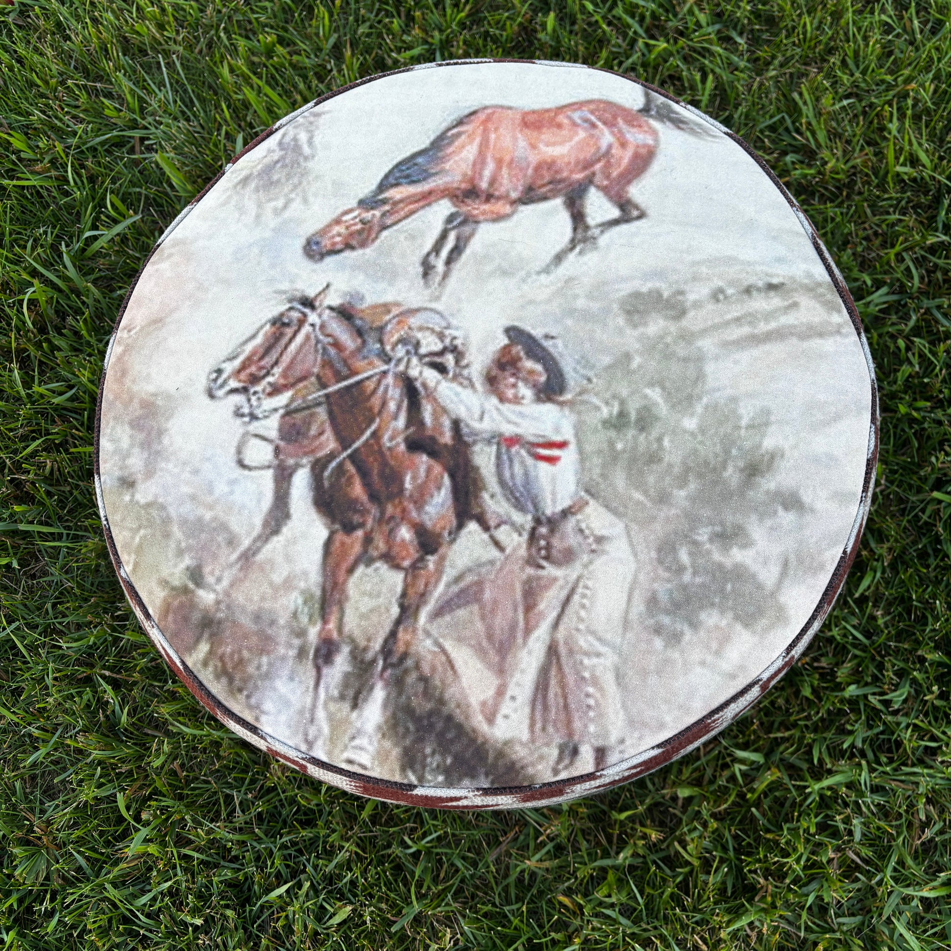 Overhead view of Western ottoman with cowboy and horse painting