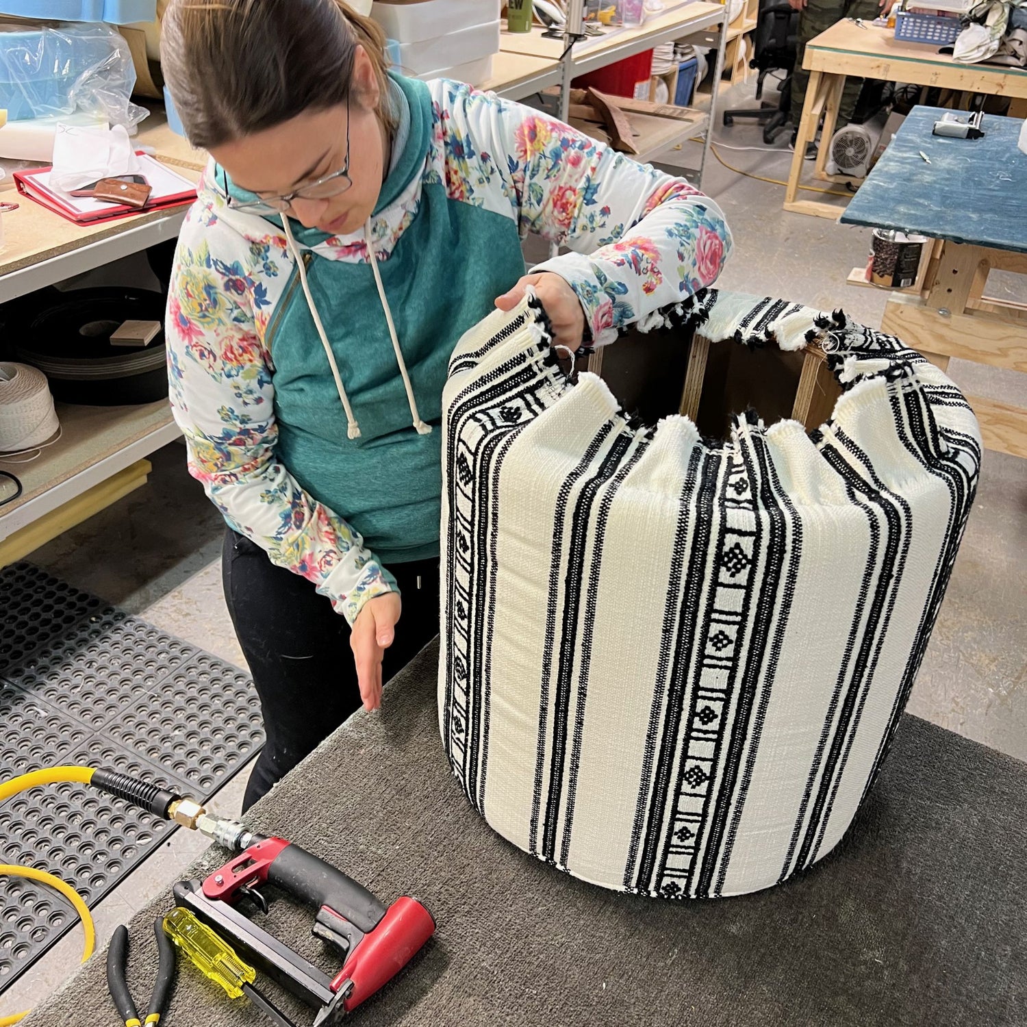 Sarah demonstrating upholstering an ottoman 1