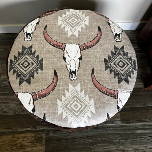 Top view of handmade ottoman with cow skull and tribal pattern print