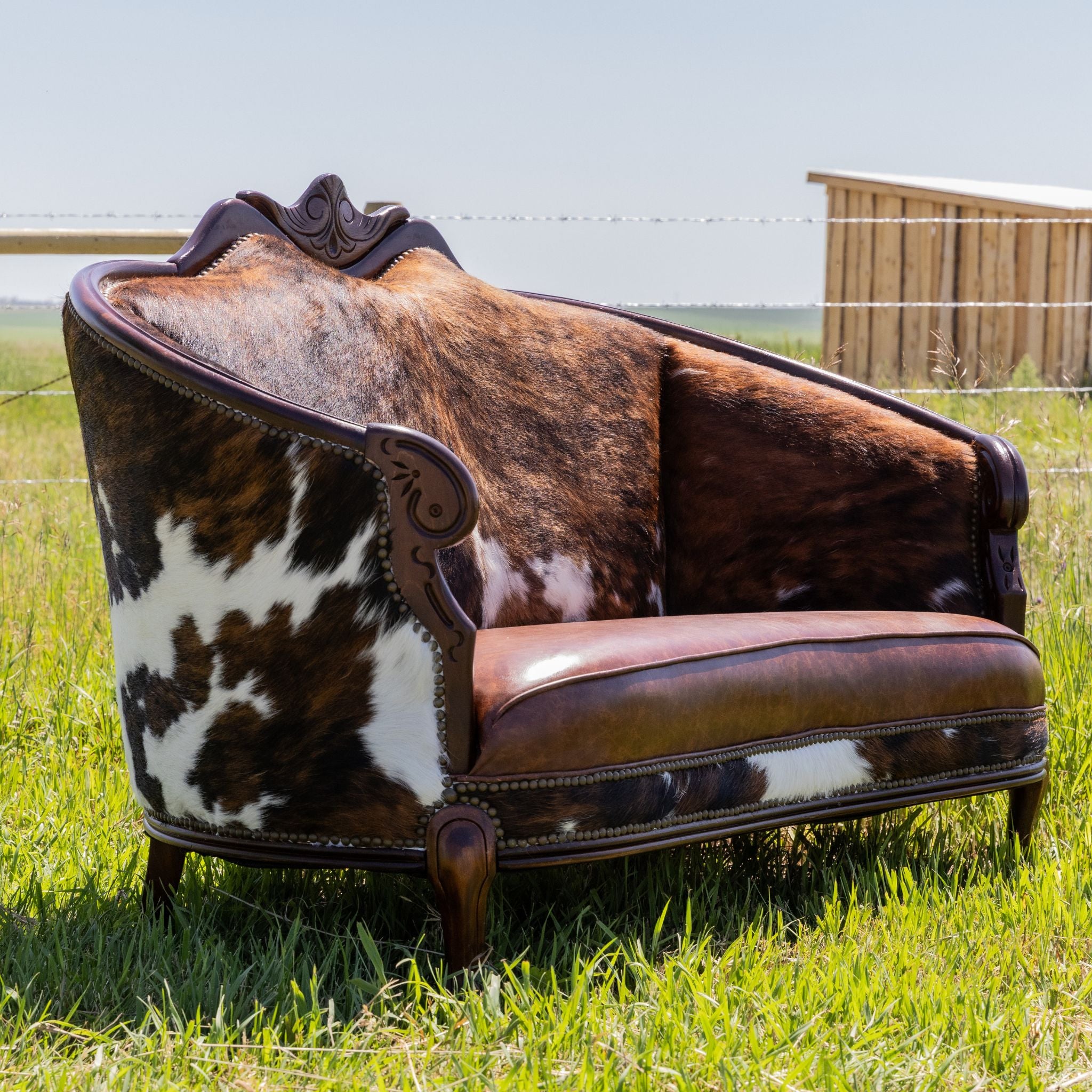 blue dog fabrics past piece cowhide and leather settee